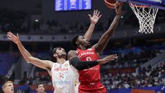 Jakarta (Indonesia), 03/09/2023.- RJ Barrett of Canada (R) in action against Santiago Aldama of Spain (L) during the FIBA Basketball World Cup 2023 group stage second round match between Spain and Canada in Jakarta, Indonesia, 03 September 2023. (Baloncesto, España) EFE/EPA/MAST IRHAM
