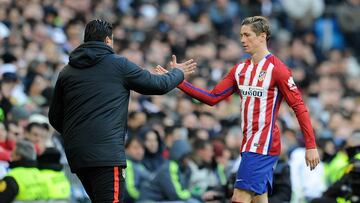 Fernando Torres y Germán Burgos, en un partido del Atlético.