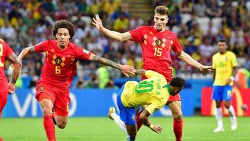 Brazil's forward Neymar (C) vies for the ball with Belgium's defender Thomas Meunier (R) and Belgium's midfielder Axel Witsel (L) during the Russia 2018 World Cup quarter-final football match between Brazil and Belgium at the Kazan Arena in