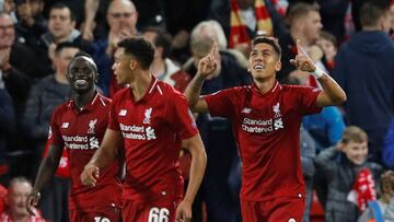 Soccer Football - Champions League - Group Stage - Group C - Liverpool v Paris St Germain - Anfield, Liverpool, Britain - September 18, 2018 Liverpool's Roberto Firmino celebrates scoring their third goal REUTERS/Phil Noble