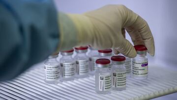 ROME, ITALY - FEBRUARY 23: A healthcare worker of the Italian Army prepares doses of the AstraZeneca COVID-19 vaccine, as part of COVID-19 vaccinations plan for the military personnel, on February 23, 2021 in Rome, Italy. A Covid-19 vaccination hub has been set up in the military citadel of Cecchignola, near Rome and is said to inoculate 2,500 citizens per day. (Photo by Antonio Masiello/Getty Images)