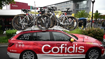 Bicycles sit on a roof-rack atop a Cofidis team vehicle before the start of the 3rd stage of the 112th edition of the Tour de France cycling race, 178.3 km between Valenciennes and Dunkerque (Dunkirk), Northern France, on July 7, 2025. The Cofidis team had 11 bicycles stolen from a team truck on the night of July 5 to July 6, before the Tour de France's 2nd stage, in northern France. (Photo by Loic VENANCE / AFP)