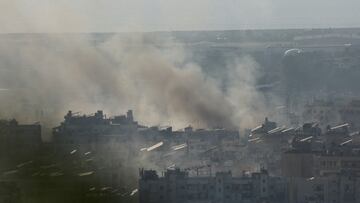Smoke rises in Beirut's southern suburbs after a strike, amid the ongoing hostilities between Hezbollah and Israeli forces, as seen from Hadath, Lebanon, October 8, 2024. REUTERS/Mohamed Azakir