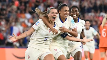 France's midfielder #06 Sandie Toletti (L) celebrates with France's midfielder #07 Sakina Karchaoui (C) after scoring France's first goal during the UEFA Women's Euro 2025 Group D football match between The Netherlands and France at the St. Jakob-Park Stadium in Basel, on July 13, 2025. (Photo by SEBASTIEN BOZON / AFP)