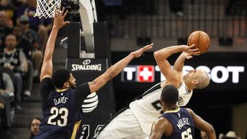 Mar 15, 2018; San Antonio, TX, USA; San Antonio Spurs shooting guard Manu Ginobili (20) shoots the ball over New Orleans Pelicans power forward Anthony Davis (23) during the second half at AT&T Center. Mandatory Credit: Soobum Im-USA TODAY Sports