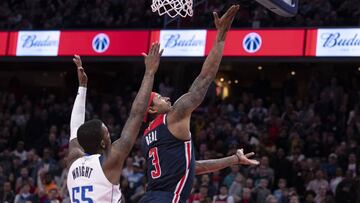 Feb 7, 2020; Washington, District of Columbia, USA; Washington Wizards guard Bradley Beal (3) scores the game winning basket as Dallas Mavericks guard Delon Wright (55) defends during the fourth quarter at Capital One Arena. Mandatory Credit: Tommy Gilligan-USA TODAY Sports
