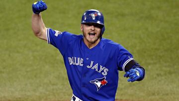 Toronto Blue Jays' Josh Donaldson celebrates his two run home run against the Kansas City Royals during the third inning in Game 3 of baseball's American League Championship Series on Monday, Oct. 19, 2015, in Toronto. (AP Photo/Paul Sancya)