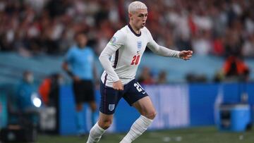 England's midfielder Phil Foden controls the bapp during the UEFA EURO 2020 semi-final football match between England and Denmark at Wembley Stadium in London on July 7, 2021. (Photo by Laurence Griffiths / POOL / AFP)