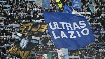 Lazio's supporters wave a gian flag "Ultras Lazio" before the UEFA Europa League football match between Lazio and Real Sociedad at the Olympic Stadium in Rome on January 23, 2025. (Photo by Filippo MONTEFORTE / AFP)