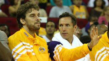 FRESNO, CA - OCTOBER 07: Pau Gasol #16 (L) and Steve Nash #10 of the Los Angeles Lakers talk on the bench during the second half of the game with the Golden State Warriors at Save Mart Center At Fresno State on October 7, 2012 in Fresno, California. The Warriors won 110-83. NOTE TO USER: User expressly acknowledges and agrees that, by downloading and or using this photograph, User is consenting to the terms and conditions of the Getty Images License Agreement. Stephen Dunn/Getty Images/AFP
== FOR NEWSPAPERS, INTERNET, TELCOS & TELEVISION USE ONLY ==