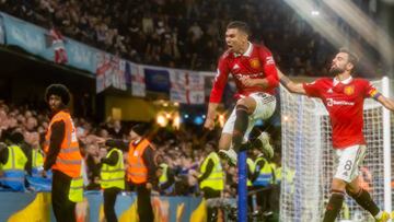 LONDON, ENGLAND - OCTOBER 22: Casemiro of Manchester United celebrates scoring a goal to make the score 1-1 with Bruno Fernandes during the Premier League match between Chelsea FC and Manchester United at Stamford Bridge on October 23, 2022 in London, United Kingdom. (Photo by Ash Donelon/Manchester United via Getty Images)