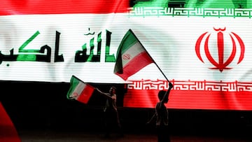 Iraqi boys hold Iranian flags as they celebrate what they and other Iraqis celebrating say is Iran's victory, after U.S. President Donald Trump announced a ceasefire between Israel and Iran, in Baghdad, Iraq, June 24, 2025. REUTERS/Ahmed Saad
