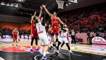 Spain's power forward #04 Jaime Pradilla defends the net during the FIBA EuroBasket 2025 basketball match between Georgia and Spain at Spyros Kyprianou Arena in Limassol on August 28, 2025. (Photo by Jewel SAMAD / AFP)