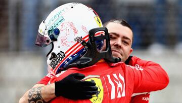 AUSTIN, TX - OCTOBER 20: Second place qualifier Sebastian Vettel of Germany and Ferrari is hugged by a Ferrari team member in parc ferme during qualifying for the United States Formula One Grand Prix at Circuit of The Americas on October 20, 2018 in Austin, United States. Mark Thompson/Getty Images/AFP
== FOR NEWSPAPERS, INTERNET, TELCOS & TELEVISION USE ONLY ==