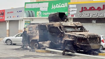 TRIPOLI, LIBYA - MAY 14: A general view of the a burnt armored military vehicle in clashes between Libyan security forces and the militia group called "Stability Support Apparatus" following the start of the ceasefire in Libyan capital Tripoli on May 14, 2025. Many houses, cars and shops were damaged in the Ain Zara, Ras Hassan, and Bin Ashur neighborhoods of Tripoli, where the clashes were intense. Libya's Defense Ministry said Wednesday a ceasefire took effect in the capital, Tripoli, after renewed armed clashes. A ministry statement said the ceasefire began in all areas of tension in Tripoli as part of efforts "to protect civilians, preserve state institutions, and avoid further escalation." (Photo by Hazem Turkia/Anadolu via Getty Images) LIBIA TRIPOLI