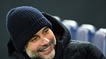 Manchester City's Spanish manager Pep Guardiola reacts during the English FA Cup fifth round football match between Luton Town and Manchester City at Kenilworth Road stadium in Luton, central England, on February 27, 2024. (Photo by JUSTIN TALLIS / AFP) / RESTRICTED TO EDITORIAL USE. No use with unauthorized audio, video, data, fixture lists, club/league logos or 'live' services. Online in-match use limited to 120 images. An additional 40 images may be used in extra time. No video emulation. Social media in-match use limited to 120 images. An additional 40 images may be used in extra time. No use in betting publications, games or single club/league/player publications. /