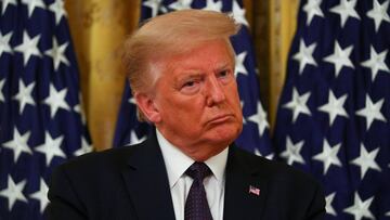 Trump intenta frenar el "libro bomba" que amenaza su futuro