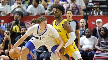 LAS VEGAS, NEVADA - JULY 10: Cooper Flagg #32 of the Dallas Mavericks is guarded by Bronny James #9 of the Los Angeles Lakers in the first half of a 2025 NBA Summer League game at the Thomas & Mack Center on July 10, 2025 in Las Vegas, Nevada. NOTE TO USER: User expressly acknowledges and agrees that, by downloading and or using this photograph, User is consenting to the terms and conditions of the Getty Images License Agreement. Ethan Miller/Getty Images/AFP (Photo by Ethan Miller / GETTY IMAGES NORTH AMERICA / Getty Images via AFP)