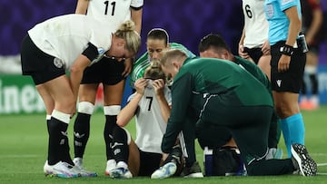 Soccer Football - Women's Euro 2025 - Group C - Germany v Poland - Arena St. Gallen, St. Gallen, Switzerland - July 4, 2025 Germany's Giulia Gwinn receives medical attention after sustaining an injury REUTERS/Stephane Mahe