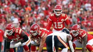 KANSAS CITY, MISSOURI - AUGUST 22: Quarterback Patrick Mahomes #15 of the Kansas City Chiefs prepares to take a snap during the first quarter of the NFL preseason game against the Chicago Bears at Arrowhead Stadium on August 22, 2025 in Kansas City, Missouri. Jamie Squire/Getty Images/AFP (Photo by JAMIE SQUIRE / GETTY IMAGES NORTH AMERICA / Getty Images via AFP)