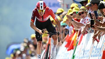 INEOS Grenadiers team's Spanish rider Carlos Rodriguez cycles to the finish line of the 13th stage of the 112th edition of the Tour de France cycling race, 10.9 km individual time trial between Loudenvielle and Peyragudes, in the Pyrenees mountains of southwestern France, on July 18, 2025. (Photo by Loic VENANCE / AFP)