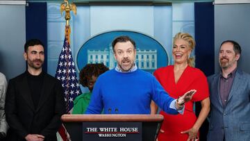 Jason Sudeikis takes to the podium as fellow Ted Lasso cast members, including Brett Goldstein, Hannah Waddingham and Brendan Hunt, join Press Secretary Karine Jean-Pierre (2ndL) at the daily press briefing to discuss the importance of addressing mental health to promote overall well-being, in the Brady Press Briefing Room at the White House in Washington, U.S., March 20, 2023. REUTERS/Kevin Lamarque
