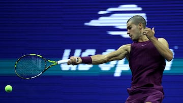 Tennis - U.S. Open - Flushing Meadows, New York, United States - August 25, 2025 Spain's Carlos Alcaraz in action during his first round match against Reilly Opelka of the U.S. REUTERS/Jeenah Moon