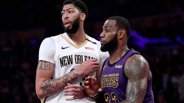 LOS ANGELES, CALIFORNIA - DECEMBER 21: LeBron James #23 of the Los Angeles Lakers guards Anthony Davis #23 of the New Orleans Pelicans during a 112-104 Laker win at Staples Center on December 21, 2018 in Los Angeles, California. NOTE TO USER: User expressly acknowledges and agrees that, by downloading and or using this photograph, User is consenting to the terms and conditions of the Getty Images License Agreement. Harry How/Getty Images/AFP
== FOR NEWSPAPERS, INTERNET, TELCOS & TELEVISION USE ONLY ==