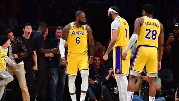 Apr 24, 2023; Los Angeles, California, USA; Los Angeles Lakers forward LeBron James (6) reacts with forward Anthony Davis (3) after making a basket and drawing the fould against the Memphis Grizzlies during overtime in game four of the 2023 NBA playoffs at Crypto.com Arena. Mandatory Credit: Gary A. Vasquez-USA TODAY Sports