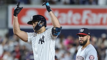 Aug 26, 2025; Bronx, New York, USA; New York Yankees right fielder Giancarlo Stanton (27) gestures after hitting a three run triple in the third inning against the Washington Nationals at Yankee Stadium. Mandatory Credit: Wendell Cruz-Imagn Images