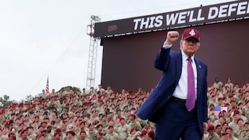 U.S. President Donald Trump pumps a fist during a rally in Fort Bragg, North Carolina, U.S., June 10, 2025. REUTERS/Evelyn Hockstein