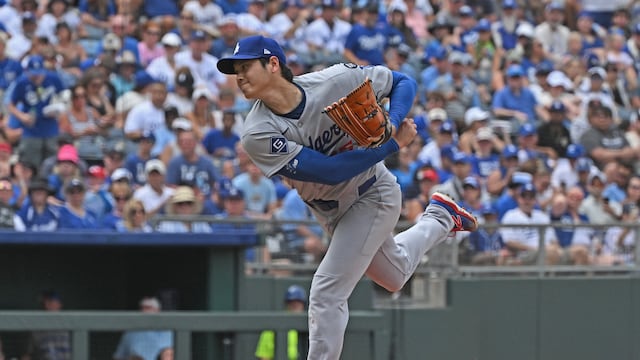 Jun 28, 2025; Kansas City, Missouri, USA; Los Angeles Dodgers designated hitter Shohei Ohtani (17) throws a pitch in the second inning against the Kansas City Royals at Kauffman Stadium. Mandatory Credit: Peter Aiken-Imagn Images