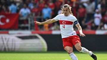 Turkey's defender #04 Caglar Soyuncu controls the ball during the friendly football match between Japan and Turkey at the Cegeka Arena in Genk, eastern Belgium, on September 12, 2023. (Photo by JOHN THYS / AFP)