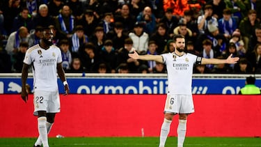 Real Madrid's German defender #22 Antonio Rudiger and Real Madrid's Spanish defender #06 Nacho Fernandez react during the Spanish league football match between Deportivo Alaves and Real Madrid CF at the Mendizorroza stadium in Vitoria on December 21, 2023. (Photo by ANDER GILLENEA / AFP)