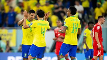 DOHA, QATAR - NOVEMBER 28: Casemiro, Marquinhos, Eder Militao of Brazil celebrating victory after the FIFA World Cup Qatar 2022 Group G match between Brazil and Switzerland at Stadium 974 on November 28, 2022 in Doha, Qatar. (Photo by Marvin Ibo Guengoer - GES Sportfoto/Getty Images)