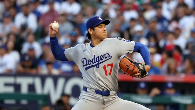 Aug 13, 2025; Anaheim, California, USA; Los Angeles Dodgers two-way player Shohei Ohtani (17) pitches during the second inning against the Los Angeles Angels at Angel Stadium. Mandatory Credit: Kiyoshi Mio-Imagn Images