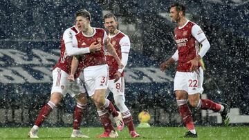 WEST BROMWICH, ENGLAND - JANUARY 02: Kieran Tierney of Arsenal celebrates with teammates Rob Holding, Dani Ceballos and Pablo Mari after scoring their team's first goal during the Premier League match between West Bromwich Albion and Arsenal at The H