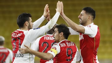 Soccer Football - Ligue 1 - AS Monaco v Olympique de Marseille - Stade Louis II, Monaco - January 23, 2021 AS Monaco's Guillermo Maripan celebrates scoring their first goal with teammates REUTERS/Eric Gaillard