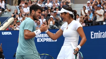 Emma Raducanu y Carlos Alcaraz, en el torneo de dobles mixto del US Open.