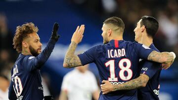 PSG's Mauro Icardi, center, celebrates with teammates Neymar, left, and Angel Di Maria after scoring the opening goal during French League One soccer match between Paris Saint-Germain and Lille at the Parc des Princes stadium in Paris, Friday, Nov. 2
