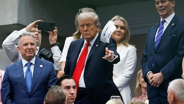 Sep 7, 2025; Flushing, NY, USA; President Donald Trump throws an autographed visor after the final of mens singles at Billie Jean King National Tennis Center. Mandatory Credit: Geoff Burke-Imagn Images