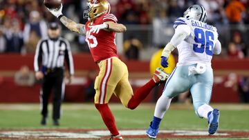 SANTA CLARA, CALIFORNIA - JANUARY 22: George Kittle #85 of the San Francisco 49ers catches a pass against the Dallas Cowboys during the third quarter in the NFC Divisional Playoff game at Levi's Stadium on January 22, 2023 in Santa Clara, California. Lachlan Cunningham/Getty Images/AFP (Photo by Lachlan Cunningham / GETTY IMAGES NORTH AMERICA / Getty Images via AFP)