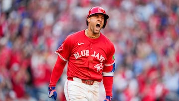 TORONTO, ON - JULY 1: George Springer #4 of the Toronto Blue Jays celebrates his grand slam home run against the New York Yankees during the seventh inning in their MLB game at the Rogers Centre on July 1, 2025 in Toronto, Ontario, Canada. Mark Blinch/Getty Images/AFP (Photo by MARK BLINCH / GETTY IMAGES NORTH AMERICA / Getty Images via AFP)