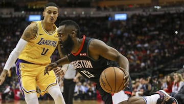 Dec 13, 2018; Houston, TX, USA; Houston Rockets guard James Harden (13) dribbles the ball against Los Angeles Lakers forward Kyle Kuzma (0) during the first quarter at Toyota Center. Mandatory Credit: Troy Taormina-USA TODAY Sports