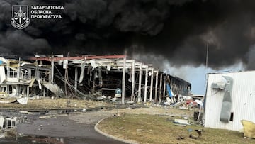 Smoke rises over the Flextronics factory hit by a Russian missile strike, amid Russia's attack on Ukraine, in Mukachevo, Zakarpattia region, Ukraine August 21, 2025. Zakarpattia Regional Prosecutor's Office/Handout via REUTERS ATTENTION EDITORS - THIS IMAGE HAS BEEN SUPPLIED BY A THIRD PARTY. DO NOT OBSCURE LOGO. NO RESALES. NO ARCHIVES.