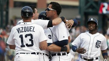 Jul 16, 2017; Detroit, MI, USA; Detroit Tigers first baseman Miguel Cabrera (center) celebrates with teammates after he draws a walk to score Alex Avila (not pictured) in the 11th inning against the Toronto Blue Jays at Comerica Park. Mandatory Credit: Rick Osentoski-USA TODAY Sports