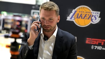 Aug 2, 2025; El Segundo, CA, USA; Los Angeles Lakers Luka Doncic (77) is interviewed by ESPN LA radio following a press conference announcing the signing of a 3-year, $165 million contract extension at UCLA Health Training Center. Mandatory Credit: Jayne Kamin-Oncea-Imagn Images