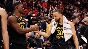 CHICAGO, ILLINOIS - FEBRUARY 08: Jimmy Butler #10 and Stephen Curry #30 of the Golden State Warriors celebrate after the game against the Chicago Bulls at the United Center on February 08, 2025 in Chicago, Illinois. NOTE TO USER: User expressly acknowledges and agrees that, by downloading and or using this photograph, User is consenting to the terms and conditions of the Getty Images License Agreement. Michael Reaves/Getty Images/AFP (Photo by Michael Reaves / GETTY IMAGES NORTH AMERICA / Getty Images via AFP)