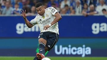 Real Madrid's French forward #10 Kylian Mbappe scores his team's second goal during the Spanish league football match between Real Oviedo and Real Madrid CF at Carlos Tartiere Stadium in Oviedo on August 24, 2025. (Photo by Cesar MANSO / AFP)