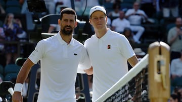 Tennis - Wimbledon - All England Lawn Tennis and Croquet Club, London, Britain - July 11, 2025 Serbia's Novak Djokovic and Italy's Jannik Sinner before their semi final match REUTERS/Toby Melville